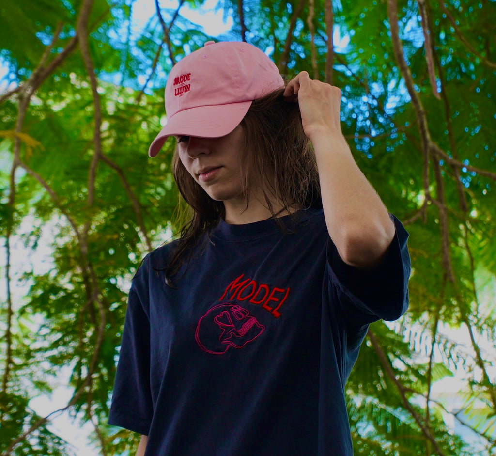 MODEL - a livin’ model, a classy color of choice shirt with love stricken skull head luvin mode